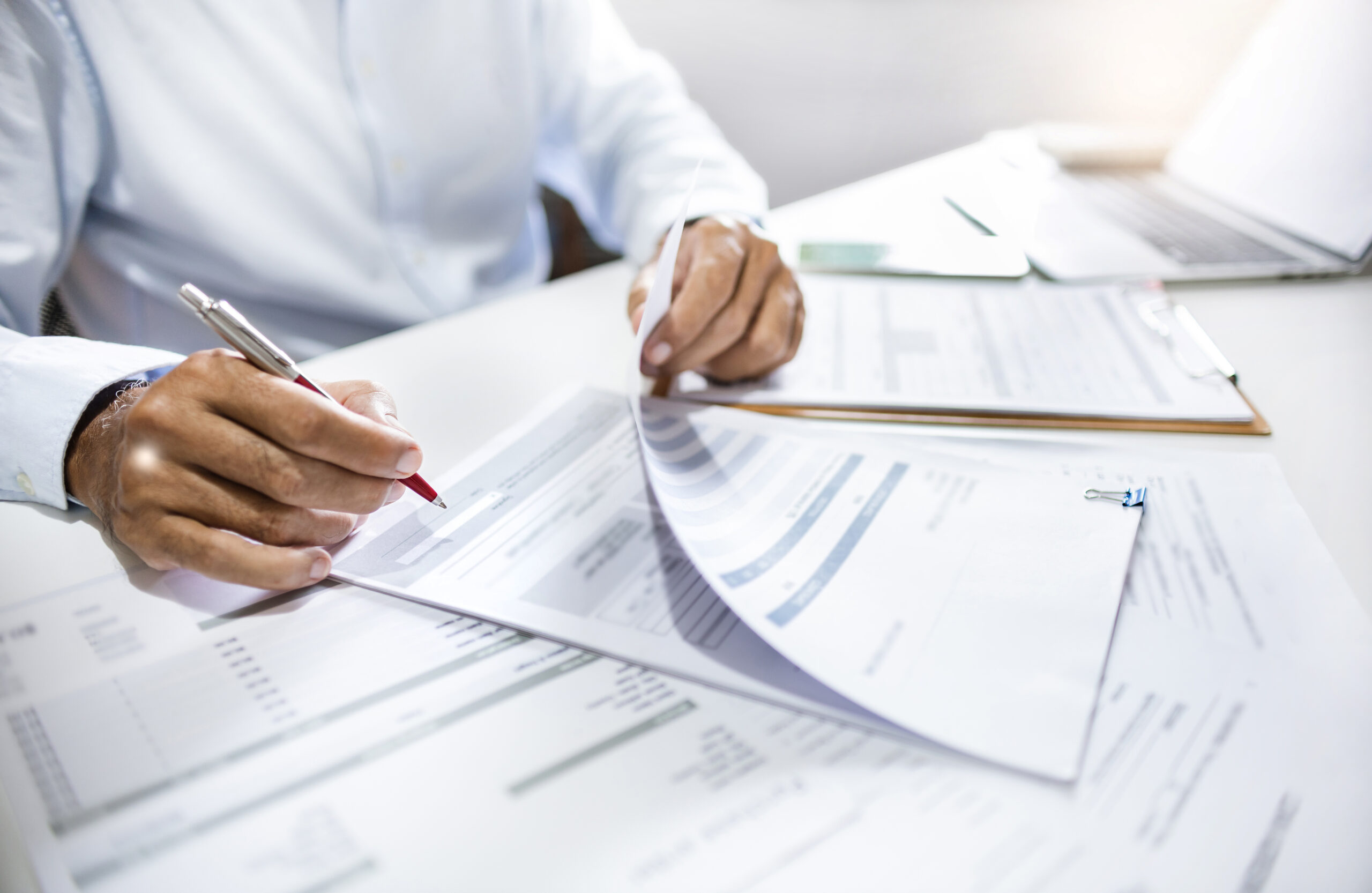 businessman going through paperwork