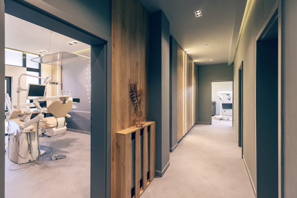 a dentist office viewed from a modern blue corridor